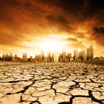 A Global Warming Concept Image with cracked earth in front of a polluted city